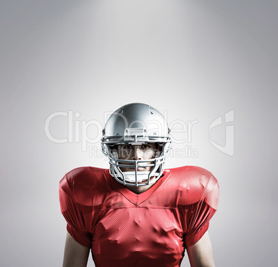 Composite image of portrait of sportsman playing american footba