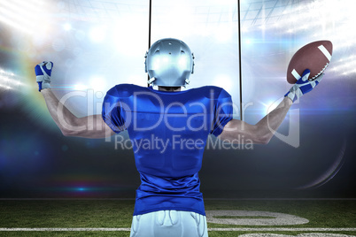 Composite image of rear view of american football player holding