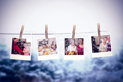 Composite image of clothes peg on line with instant photos