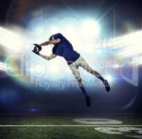 Composite image of american football player catching ball in mid