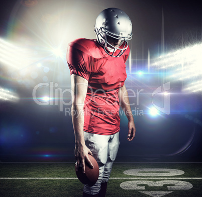 Composite image of american football player with ball looking do