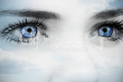 Composite image of blue eyes on grey face