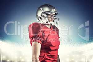 Composite image of serious american football player in red jerse