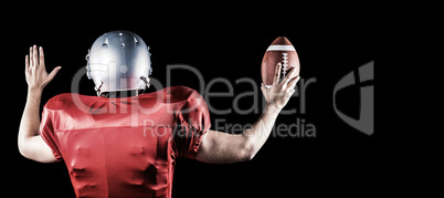 Composite image of rear view of american football player gesturi