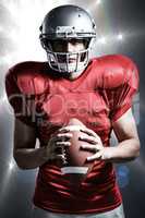 Composite image of portrait of confident american football playe