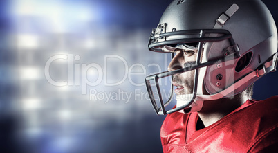 Composite image of side view of sportsman wearing helmet