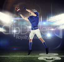 Composite image of sports player catching ball