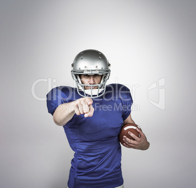 Composite image of portrait sports player pointing