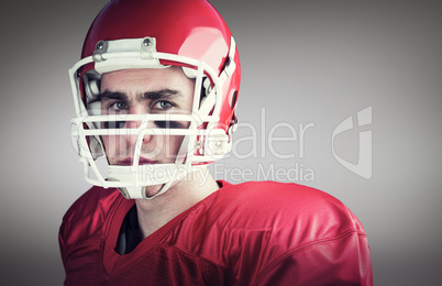 Composite image of portrait of a serious american football playe