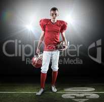 Composite image of a serious american football player taking his