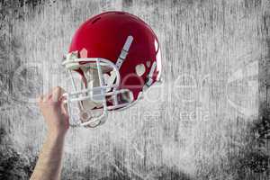 Composite image of helmet of  an american football player