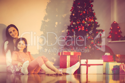 Mother and daughter waiting for santa claus