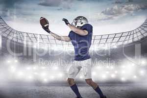 Composite image of american football player catching ball