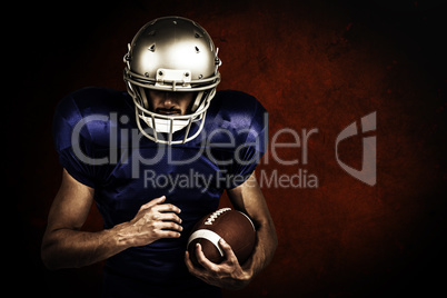 Composite image of sports player wearing helmet while holding ba