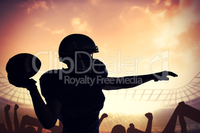 Composite image of silhouette american football player throwing