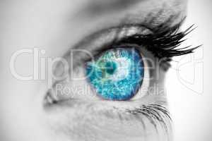Composite image of blue eye on female face
