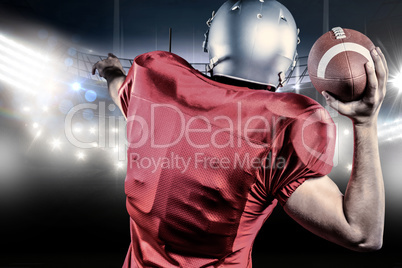 Composite image of rear view of american football player throwin