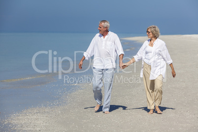 Happy Senior Couple Walking Holding Hands Tropical Beach