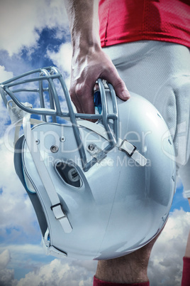 Composite image of close-up of american football player in red j