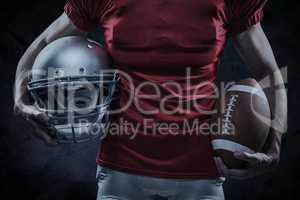 Composite image of midsection of american football player in red