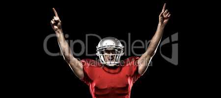 Composite image of american football player with arms raised sta