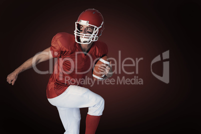 Composite image of rugby player holding the ball while lifting leg