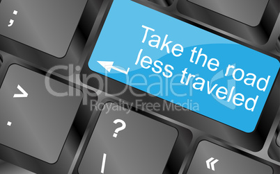 Take the road less traveled. Computer keyboard keys with quote button. Inspirational motivational quote. Simple trendy design