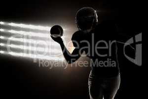 Composite image of american football player throwing ball
