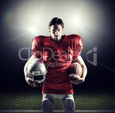 Composite image of american football player in red jersey holdin