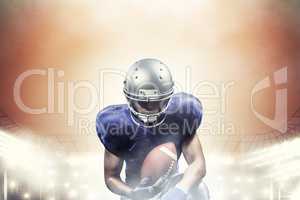 Composite image of american football player holding ball while k