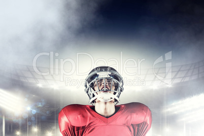 Composite image of american football player holding ball while l