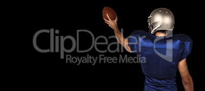 Composite image of rear view of sports player holding ball