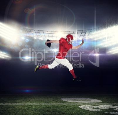 Composite image of american football player jumping with the bal
