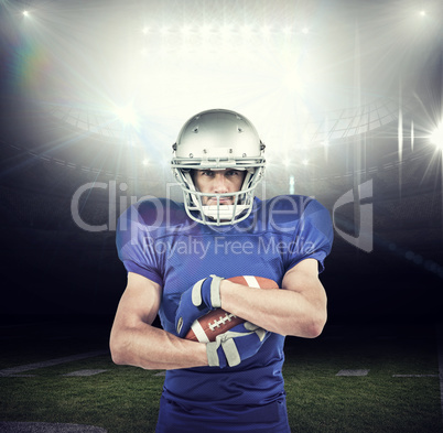 Composite image of portrait of sportsman holding ball