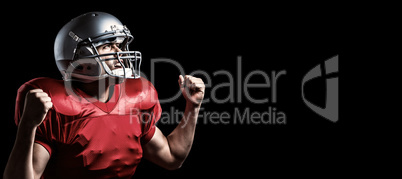 Composite image of american football player cheering with clench