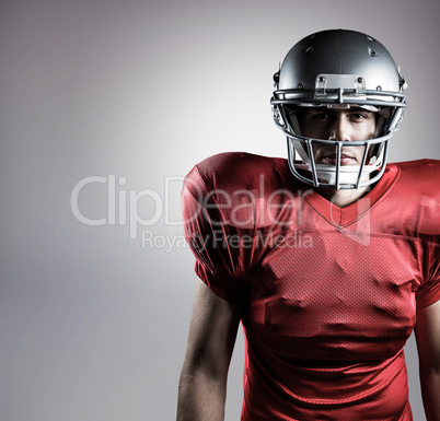 Composite image of portrait of determined american football play