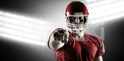 Composite image of american football player pointing at camera