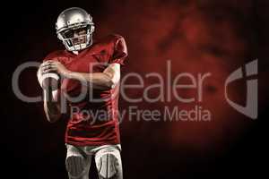 Composite image of confident american football player in red jer