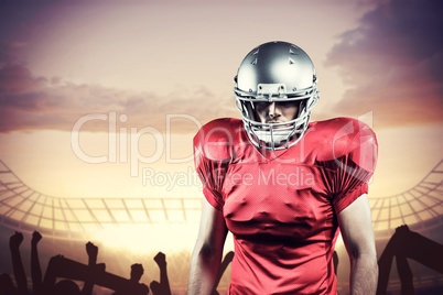 Composite image of confident american football player