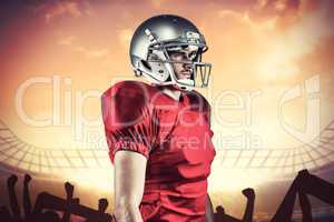 Composite image of serious american football player in red jerse