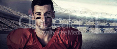 Composite image of portrait of focused rugby player