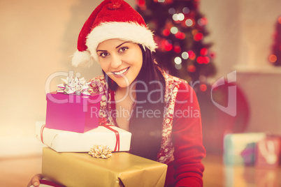 Festive brunette smiling at camera