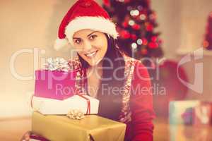 Festive brunette smiling at camera