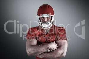 Composite image of american football player with ball