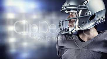 Composite image of sportsman with helmet looking away