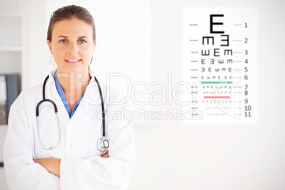 Composite image of charming doctor having a stethoscope around h