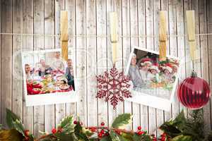 Composite image of hanging christmas photos