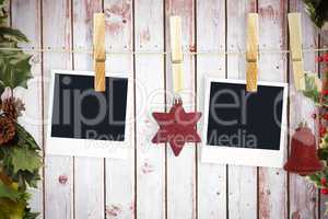 Composite image of hanging christmas photos