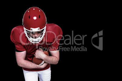 Composite image of american football player running with the ball