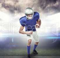 Composite image of portrait american football player holding bal